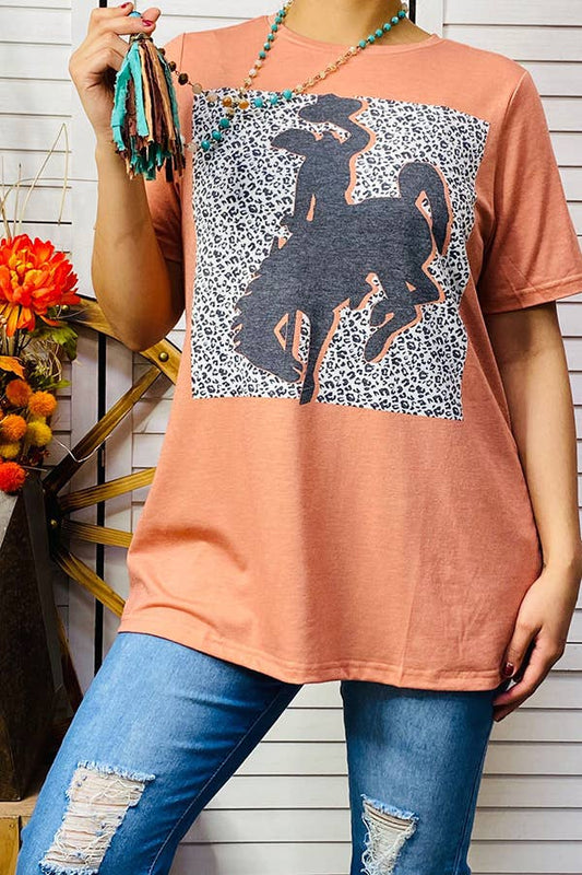 Coral top with bronc rider graphic